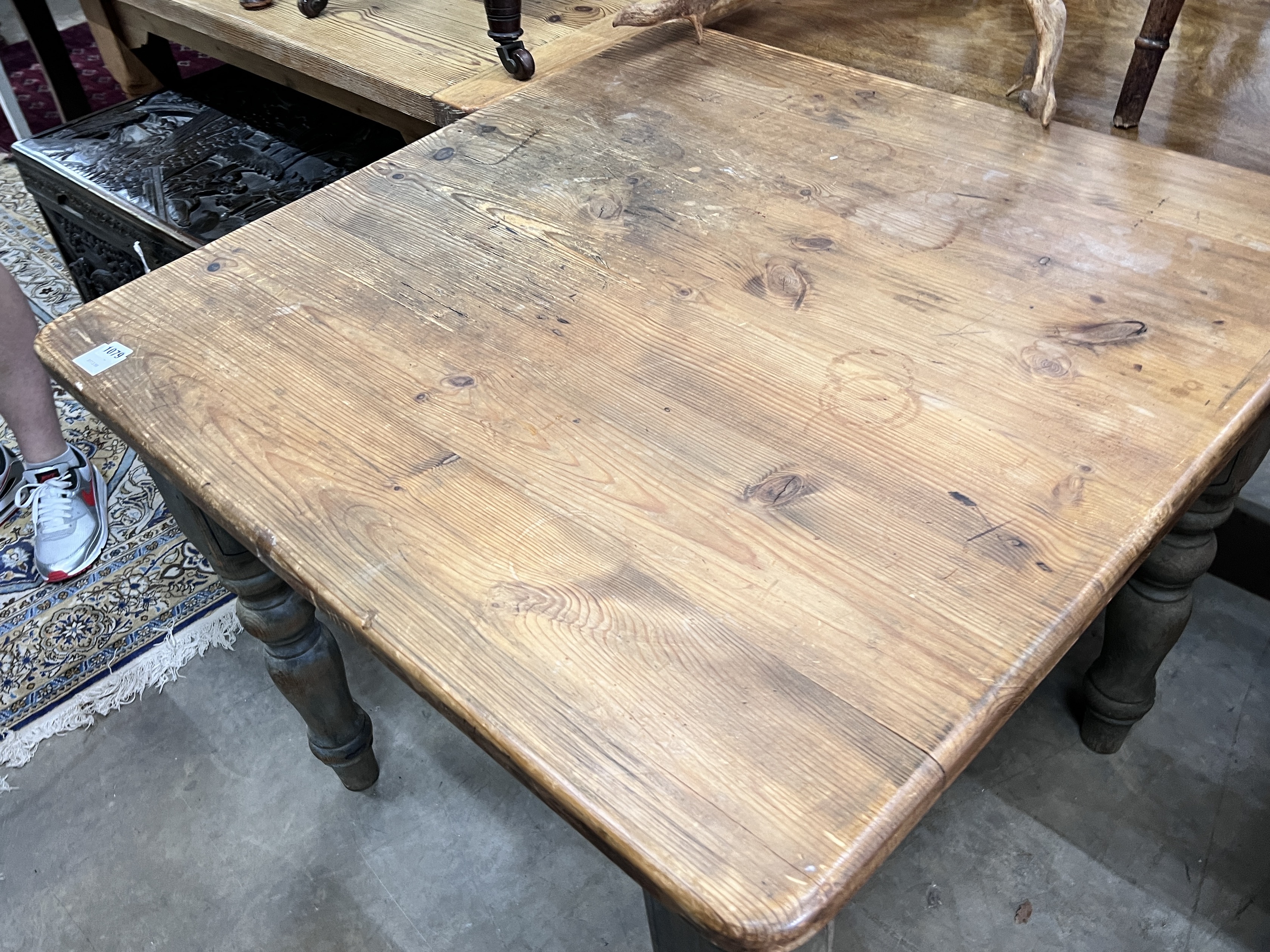 A Victorian style square pine kitchen table with painted underframe, width 90cm, height 77cm